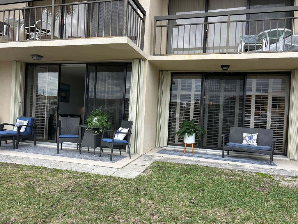 Photo of 2601 Marina Isle Way #105, Jupiter, FL 33477 (MLS # B26041217)