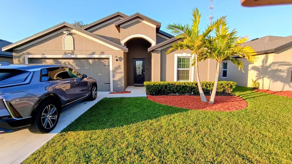 Photo of 5236 Imagination Dr, Fort Pierce, FL 34947 (MLS # R11157627)