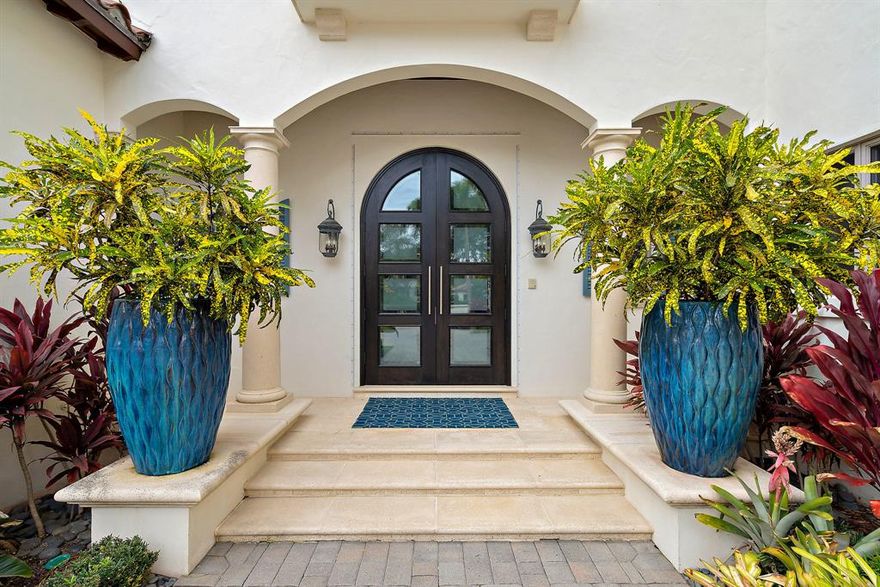 This impressive light and bright transitional home is one of a kind overlooking the natural preserve and the 5th hole of the Jack Nicklaus Signature-Trump National Golf Course. Your own tropical oasis awaits you with an upgraded and expansive pool/entertaining area with outdoor summer kitchen. Fabulous wine room for the wine connoisseur as well as game room and theatre for the whole family to enjoy. This Crestron smart home has a brand new whole house generator along with impact glass, Halo HVAC air purification system 4 air-conditioned garages, whole house water purification/softener, tankless hot water heater, Subzero and Miele appliances! This meticulously maintained Estate home is one of 30 customized homes in Eagle Tree at Trump National and offers quality construction, millwork,