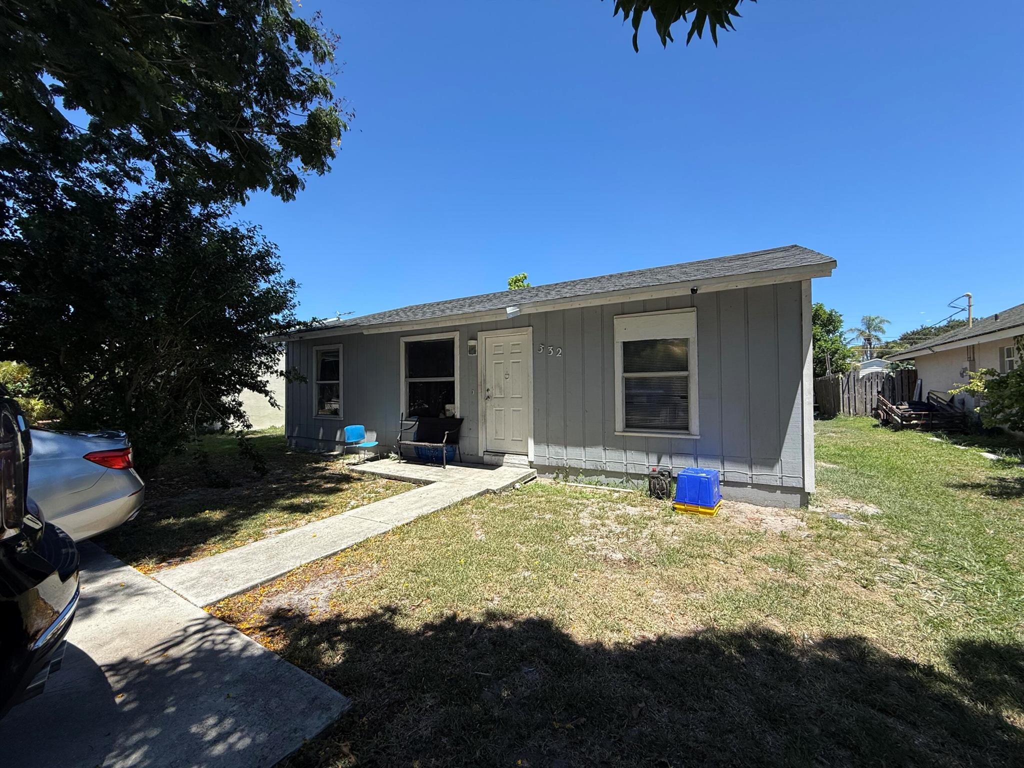 Discover an exceptional investment or future development opportunity in the heart of Greenacres. This tenant-occupied property, secured through August 2026, offers immediate rental income and long-term potential. With no HOA, enjoy unparalleled freedom to customize, expand, or build your dream home without restrictive covenants. The spacious lot provides ample room for additions, outdoor living spaces, or new construction. Situated in a desirable neighborhood close to schools, parks, shopping, and major highways, this property combines convenience with limitless possibilities. Whether you're an investor seeking steady returns or a visionary ready to create a personalized retreat, this Greenacres gem is a right find.