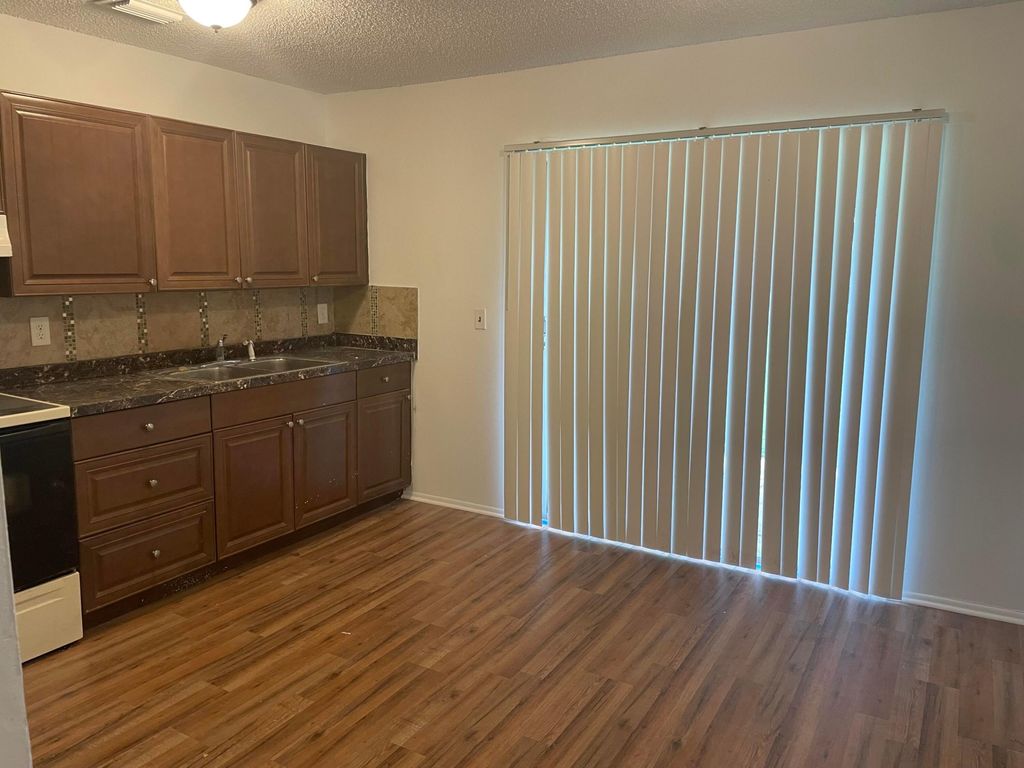 Photo of 4083 Herbertz Road, Lake Worth, FL 33461 (MLS # R10978128)