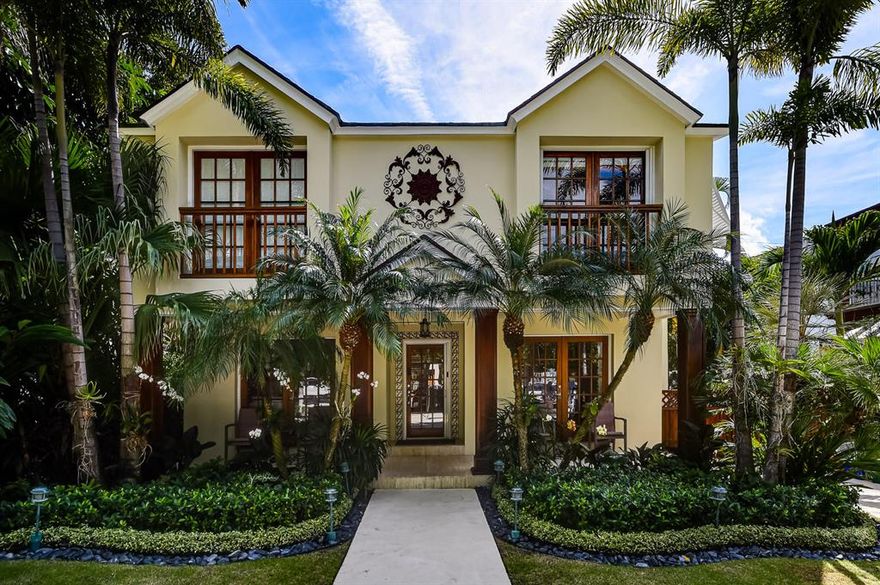 This charming Seaspray Avenue residence offers 2,754 +/- total square feet with 4 bedrooms, 4 full baths, 1 half bath, and a pool.   Ideally located in town close to the schools, restaurants, shopping, the Lake Trail, and the beach.  The living room has a fireplace, and French doors to the front and back terraces.  The updated kitchen has new cabinetry, stainless steel appliances, a gas range, and opens to the outdoor terrace overlooking the pool.   In addition to the main residence, there is a two-story guest house with a living room and half bath downstairs, and a bedroom and full bath upstairs.