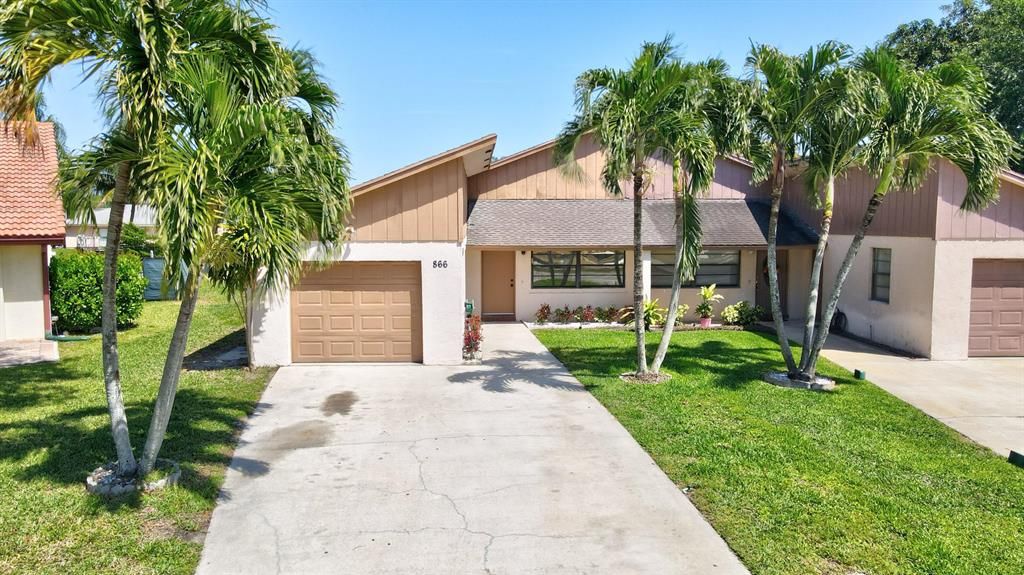 Photo of 866 Lantern Tree Lane, Wellington, FL 33414 (MLS # R10708852)