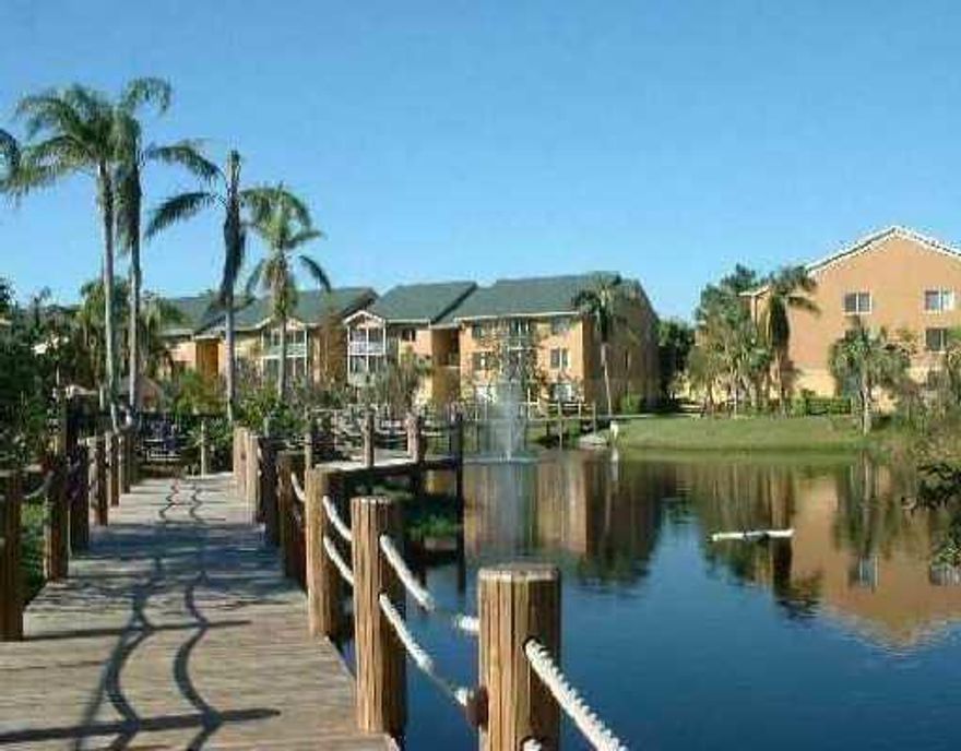 UPDATED UNIT WITH GREAT BATHROOM AND TILED THROUGHOUT. STAINLESS STEEL APPLIANCES, WASHER AND DRYER IN UNIT. VAULTED CEILING.