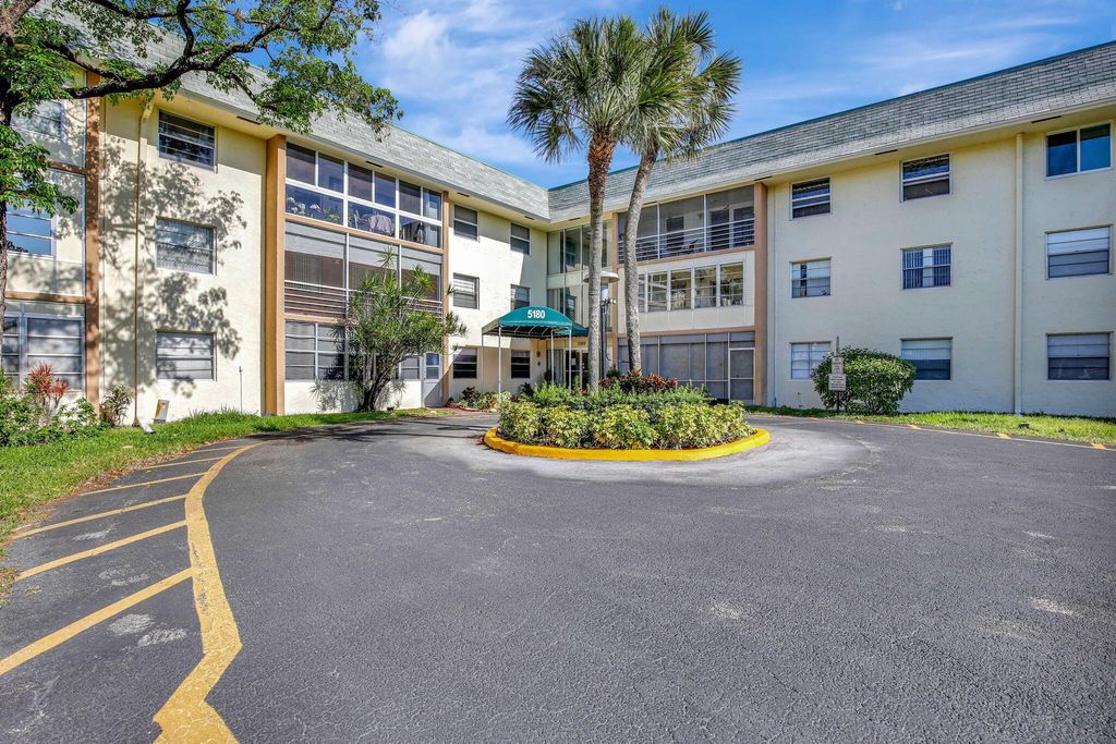 Photo of 5180 E Sabal Palm Boulevard #327, Tamarac, FL 33319 (MLS # R10979506)