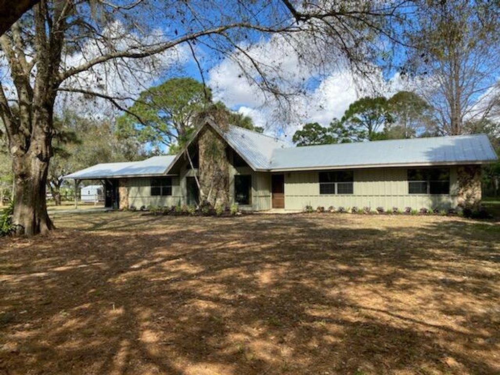 Photo of 17580 Hammock Lane, Fort Pierce, FL 34987 (MLS # R10692142)