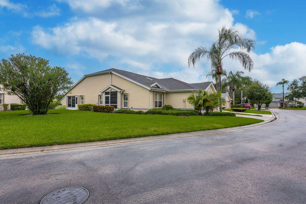 Looking for a 1264 Sq ft rental home in a peaceful community? This 2-bedroom, 2-bath house with a 2-car garage offers a perfect setting for relaxation. Enjoy the community pool, shuffleboard, or take a peaceful walk around the quiet neighborhood. Unwind in the screened Florida room overlooking a beautiful pond. The HOA handles lawn mowing for you. This unfurnished home comes with essential appliances: refrigerator, stove, microwave, dishwasher, washer, and dryer. Located just 18 minutes from Jensen Beach, 9 minutes from Port St. Lucie Botanical Gardens, and near hiking trails like Wood Stork Trail and Savanna Preserve State Park. A non-smoking, pet-free property, available for up to 5 years with annual lease renewals. Don't miss the opportunity to call this house your home!