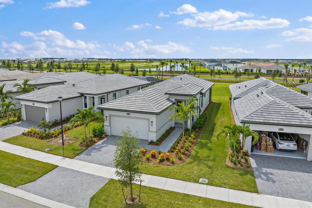 Photo of 9345 SW Pepoli Way, Port St Lucie, FL 34987 (MLS # R10922810)