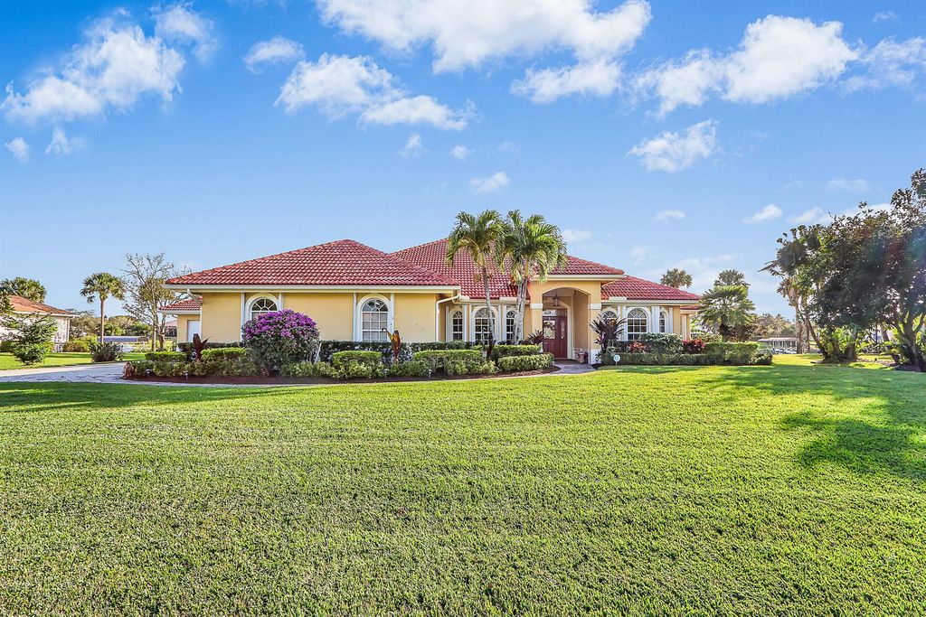 Photo of 2622 SW River Shore Drive, Port Saint Lucie, FL 34984 (MLS # R10940670)