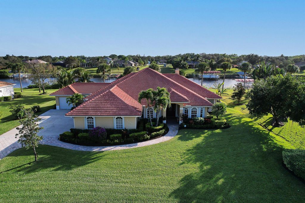 Photo of 2622 SW River Shore Drive, Port Saint Lucie, FL 34984 (MLS # R10940670)