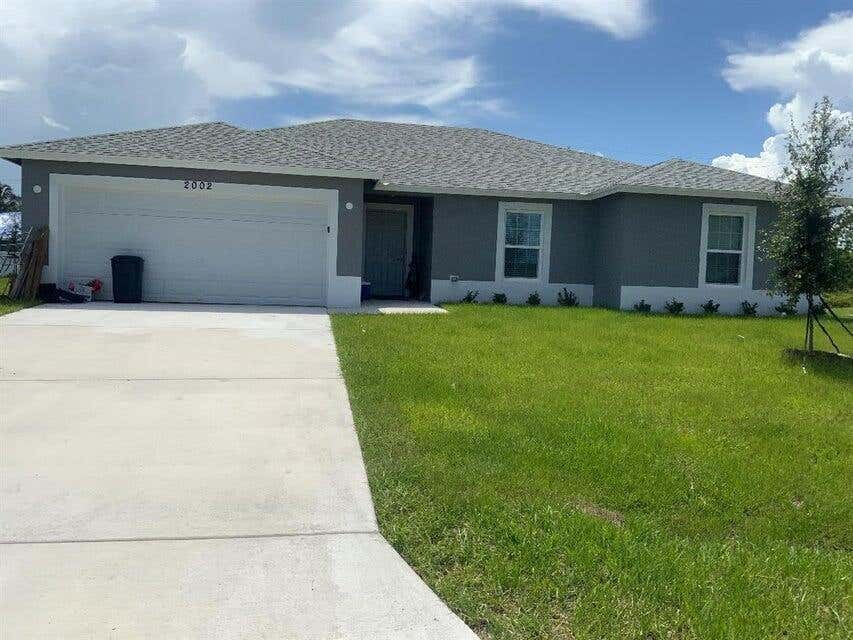 Photo of 2002 SW Greenan Ln, Port St Lucie, FL 34953 (MLS # R10903239)