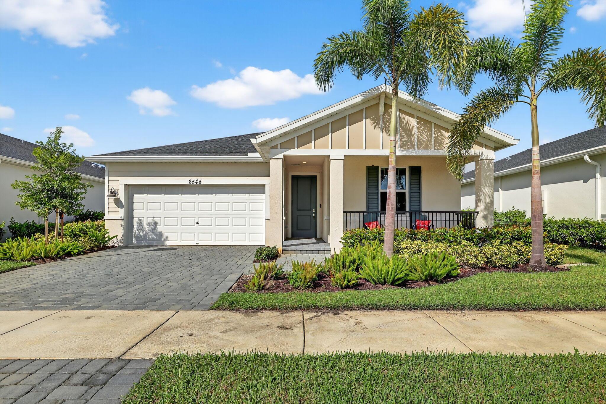 This stunning, new construction resale home, built in 2023, is located in the desirable Brystol at Wylder community, adjacent to Glylea Country Club. This spacious single-family home features 4 bedrooms and 2 bathrooms, all protected by impact windows and doors, providing both safety and energy efficiency.Step inside to discover a meticulously maintained home with modern amenities. The seamless gutters and sprinkler system make for easy exterior maintenance. The home is part of the Wylder master-planned community, offering resort-style amenities, scenic trails, and a beautiful lakefront area. With a 2-car garage and a thoughtful floor plan, this home is perfect for comfortable living and entertaining.
