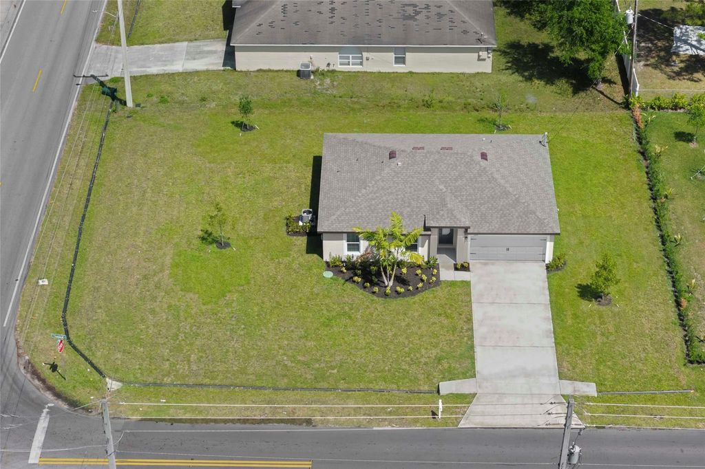 Photo of 1697 SW Hunnicut Avenue, Port Saint Lucie, FL 34953 (MLS # F10464953)