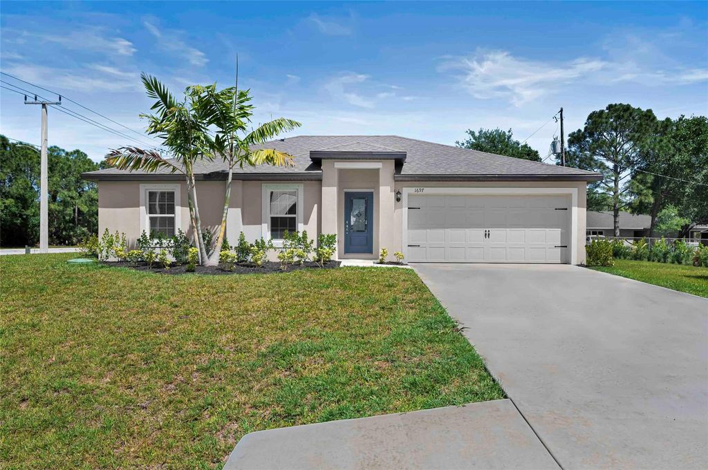Photo of 1697 SW Hunnicut Avenue, Port Saint Lucie, FL 34953 (MLS # F10464953)