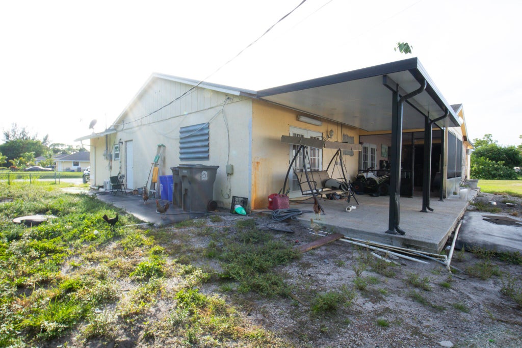 Photo of 5920 Mango Boulevard, The Acreage, FL 33411 (MLS # R11005690)