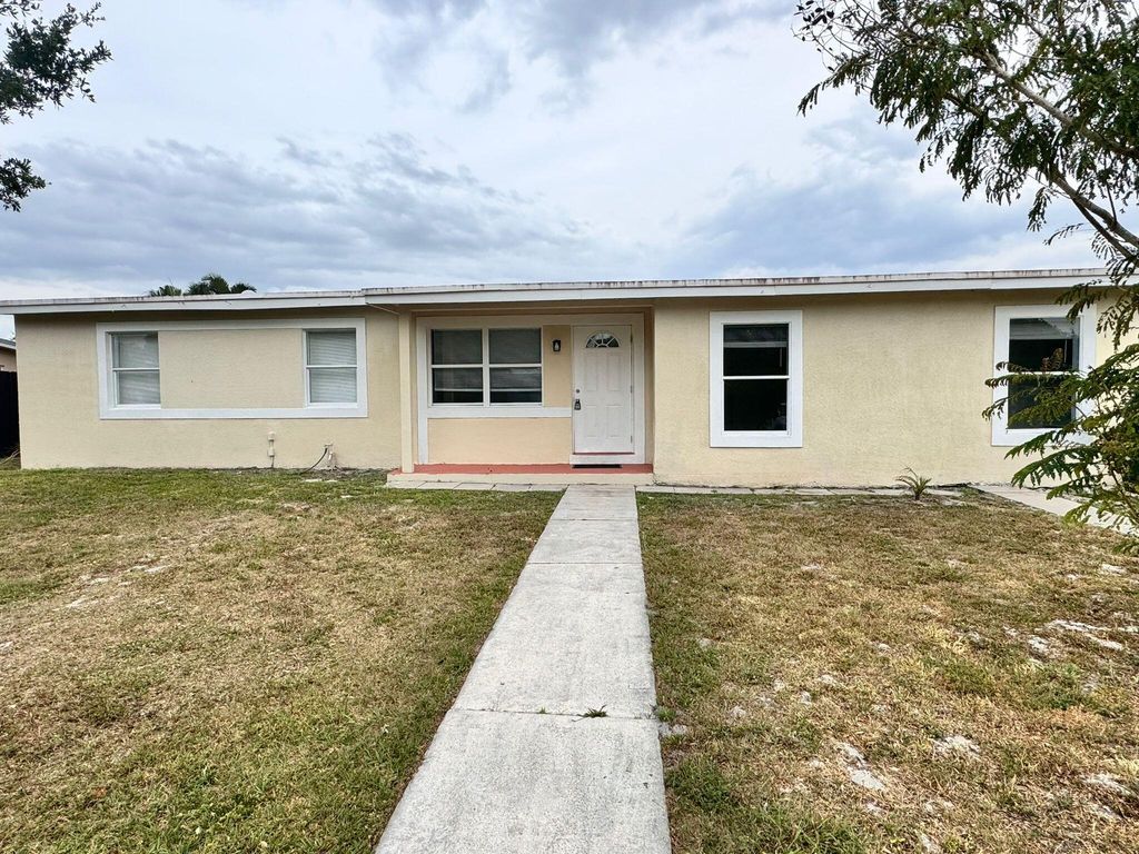 Photo of 160 Princess Drive, Port Saint Lucie, FL 34952 (MLS # R10975175)