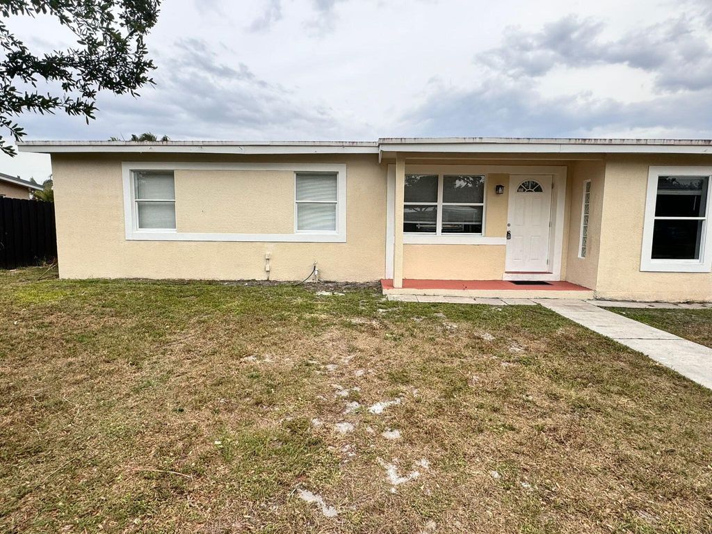Photo of 160 Princess Drive, Port Saint Lucie, FL 34952 (MLS # R10975175)