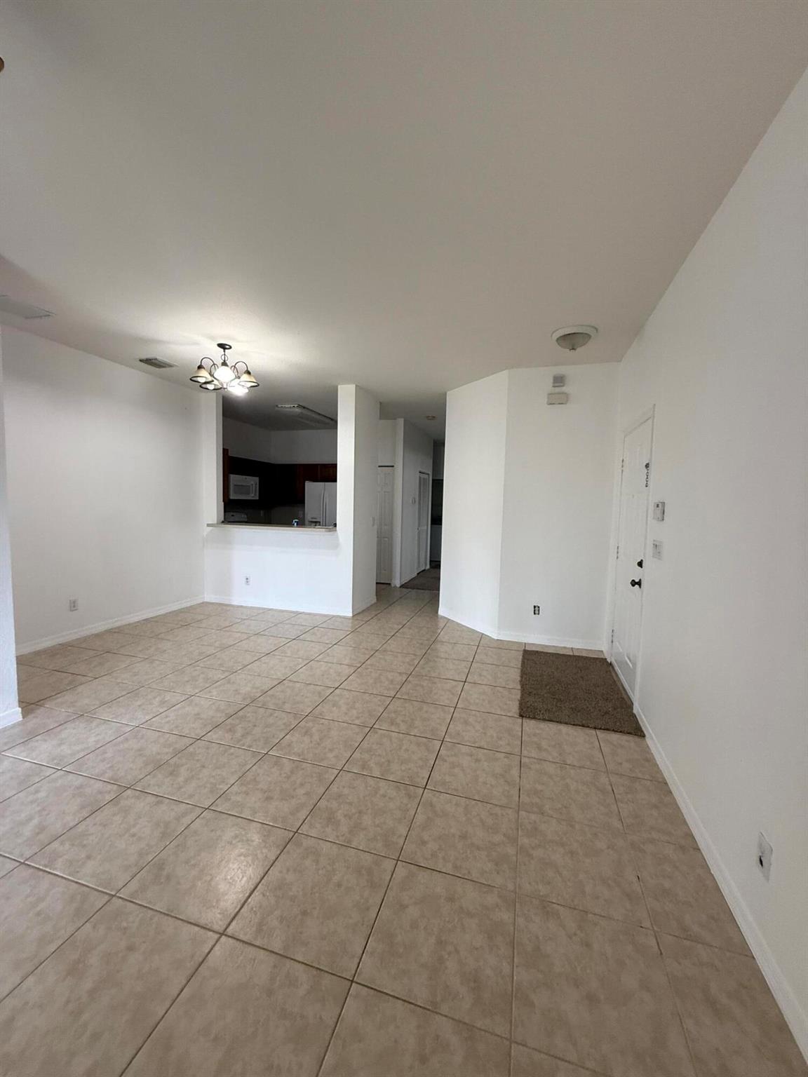 Charming and Cozy Unit in the Heart of Greenacres!This 3-bedroom, 2-bathroom home features fresh paint throughout and brand-new carpet in the bedrooms. Bright, inviting, and move-in ready, perfect for comfortable living in a convenient location.