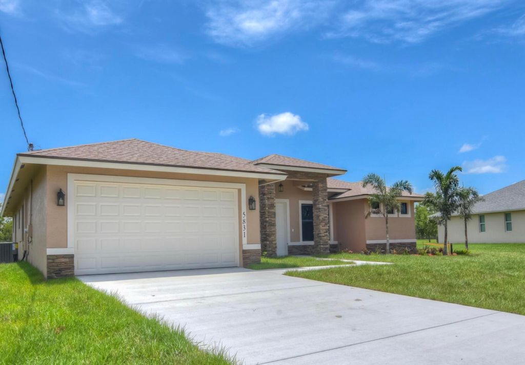 Photo of 5831 NW Dooley CIR, Port Saint Lucie, FL 34986 (MLS # B26029192)