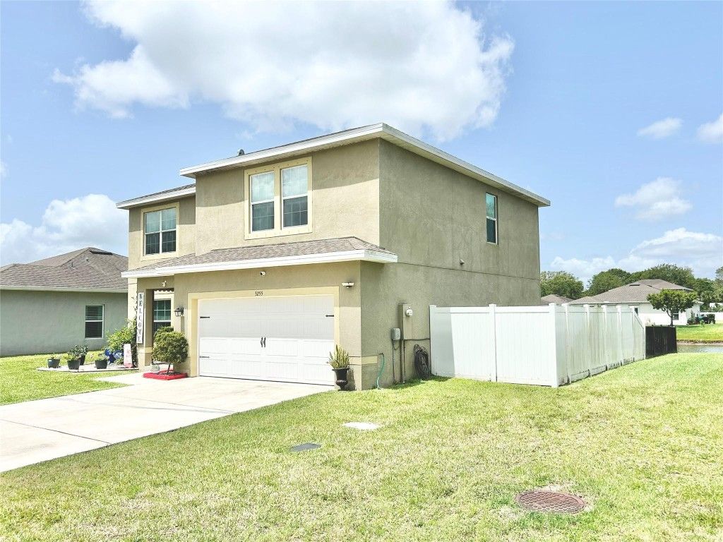 Photo of 5255 Oakland Lake Circle, Fort Pierce, FL 34951 (MLS # F10512142)