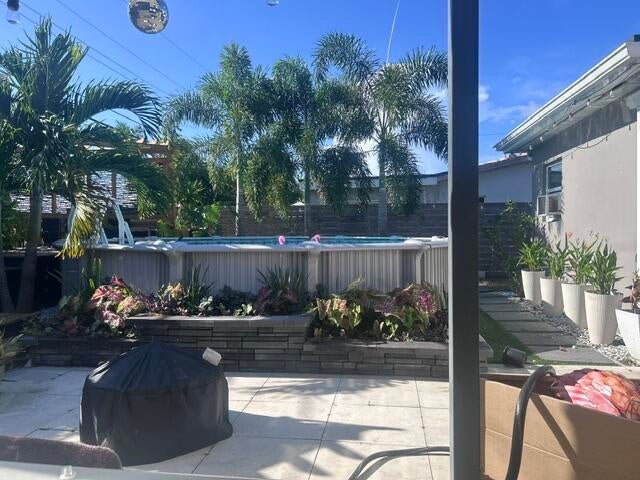 Photo of 4820 NE 4TH Avenue, Oakland Park, FL 33334 (MLS # B26080287)