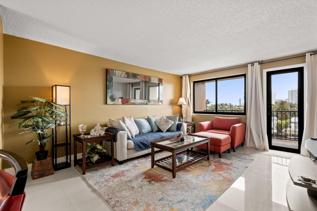 Photo of 301 Golden Isles Drive #412, Hallandale Beach, FL 33009 (MLS # B26017147)