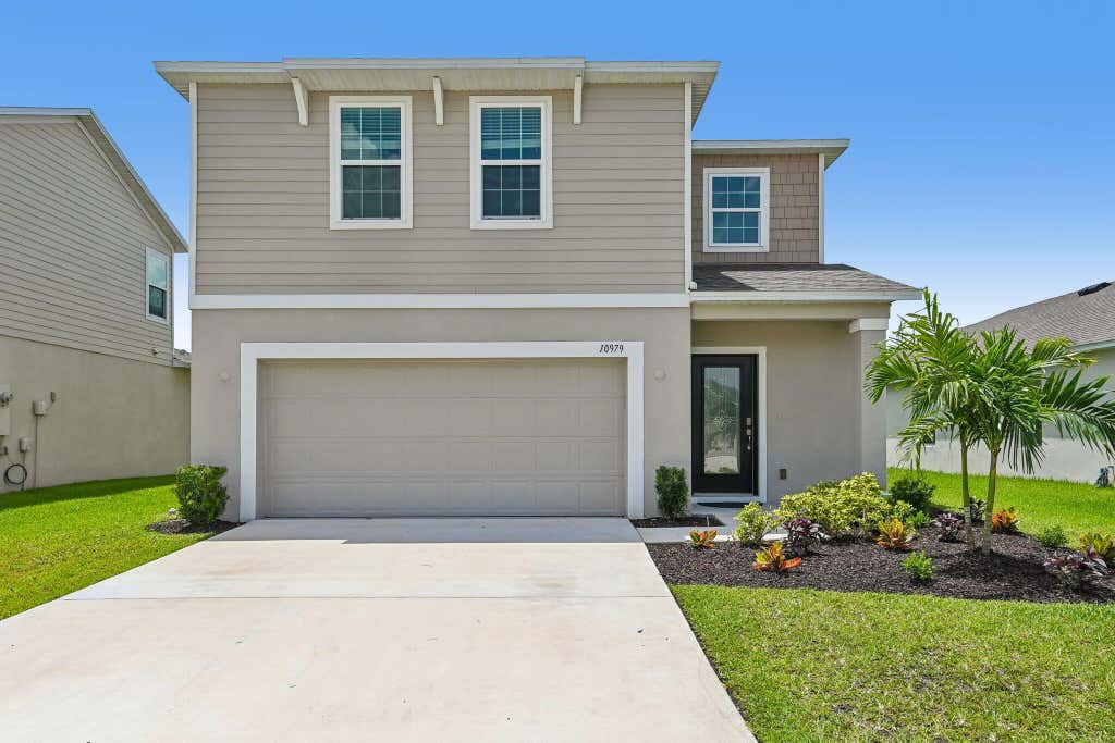 Photo of 10979 SW Vasari Way, Port Saint Lucie, FL 34987 (MLS # B26047195)