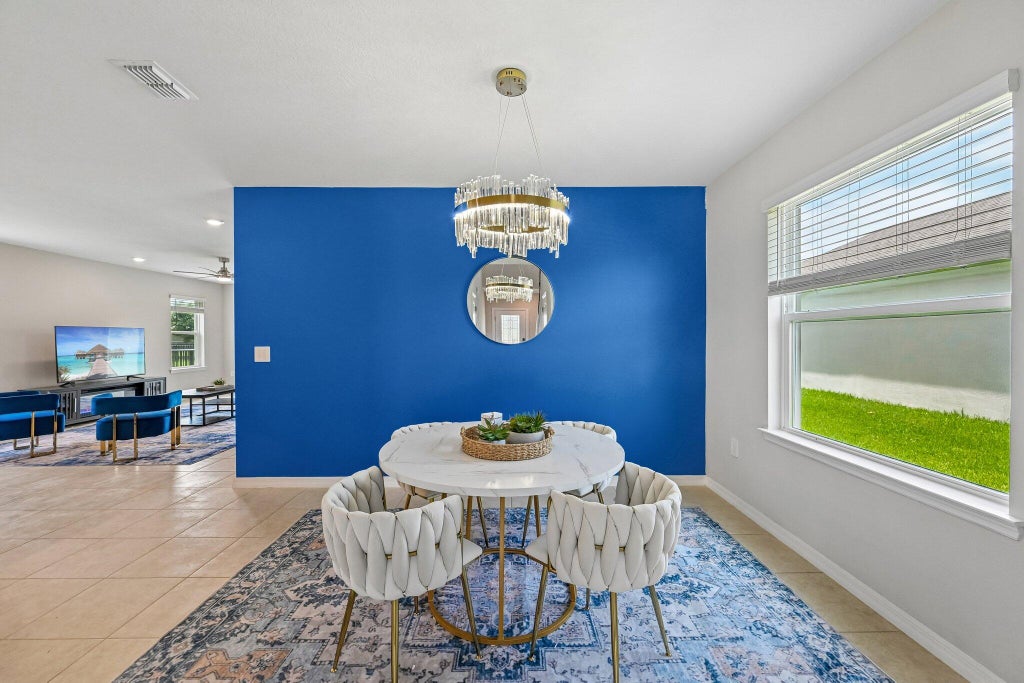 Photo of 10979 SW Vasari Way, Port Saint Lucie, FL 34987 (MLS # B26047195)