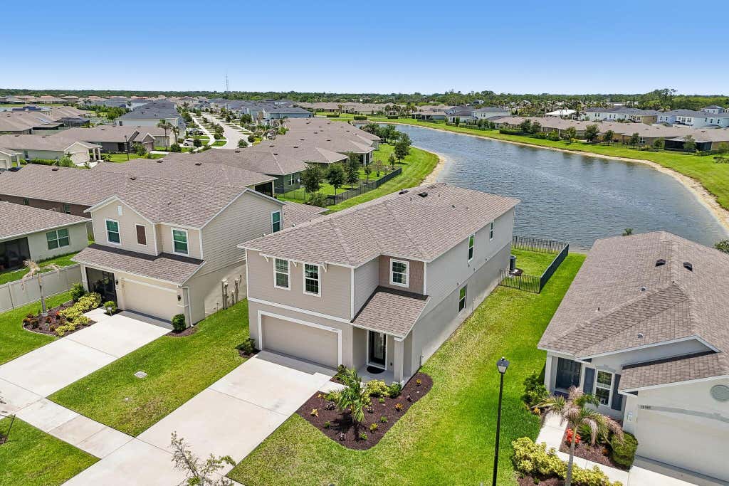 Photo of 10979 SW Vasari Way, Port Saint Lucie, FL 34987 (MLS # B26047195)
