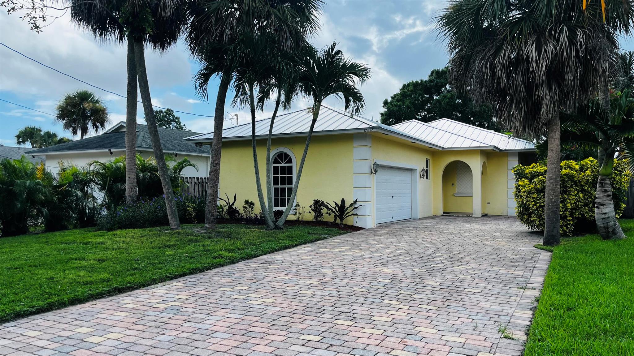 5 star rated location in the heart of Jupiter available for annual or seasonal lease! Only 4 miles from beautiful Jupiter Beach! Pet friendly with an A rated school zone. Seasonal rent includes utilities, wifi, and lawn care. Home can be furnished or unfurnished. New 50 inch smart TV's in each bedroom and an 85 inch Samsung in the living room. Pet friendly with a fully fenced backyard. This home features 3 bedrooms and 2 bathrooms with a garage. High vaulted ceilings in the living room. Granite countertops and stainless steel appliances in the kitchen. Conveniently located less than a mile away from Starbucks, Publix, Walmart, and Aldi. Fine dining such as 1000 North and local Jupiter favorites like Food Shack, U-Tiki and Guanabanas only 4 miles away! Jupiter Donut Factory is only