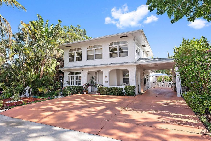 An Exquisite Spanish Colonial Estate in Prestigious Southland Park!Tucked away on a tree lined street in Southland Park-- one of West Palm Beach's most coveted enclaves--this restored 1920s Spanish Colonial Revival residence marries historic style with modern coastal sophistication. This  3,753 square foot estate unfolds with timeless architectural details: original Dade County pine floors, artisan beadboard molding, and graceful arched windows that flood its rooms with verdant garden and treetop vistas. Important upgrades include new roof and updated plumbing and electric.