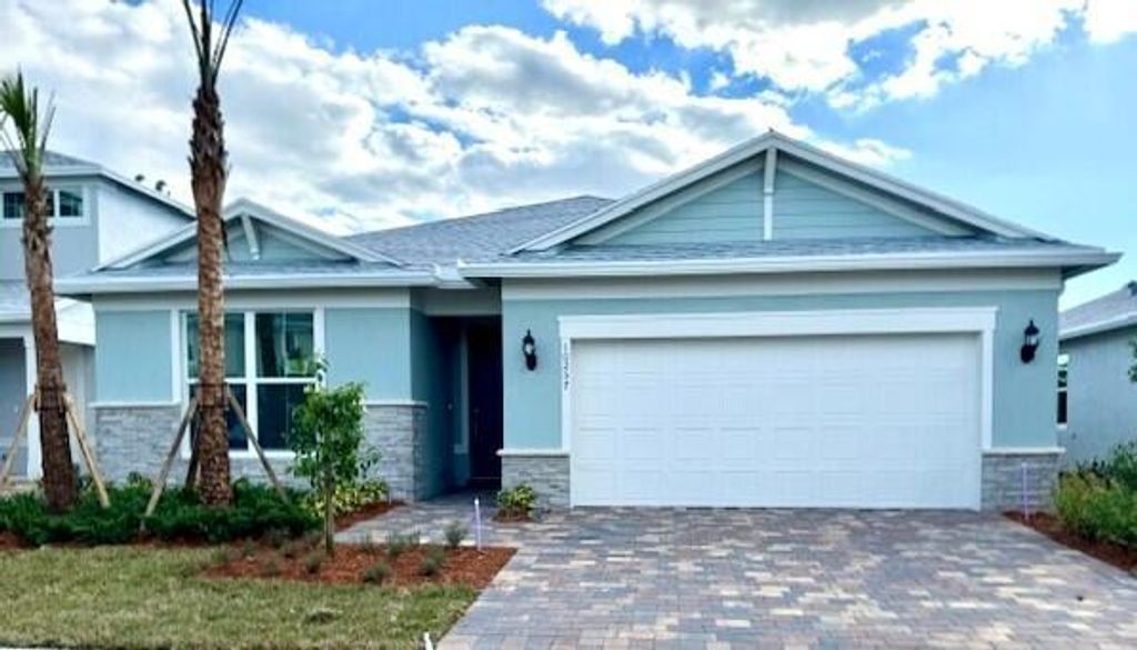 Photo of 10257 SW Captiva Drive, Port Saint Lucie, FL 34987 (MLS # R10995568)