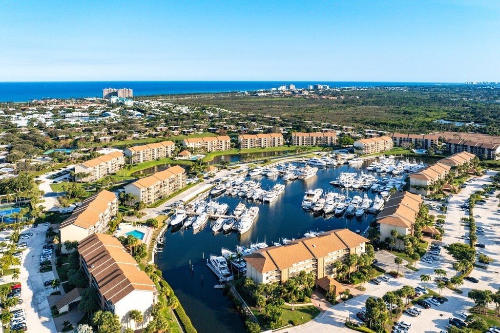 Photo of 2601 Marina Isle Way #303, Jupiter, FL 33477 (MLS # R11059452)