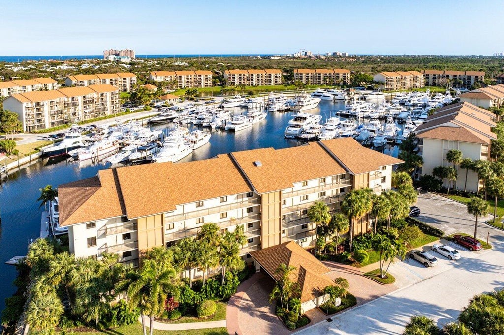 Photo of 2601 Marina Isle Way #303, Jupiter, FL 33477 (MLS # R11059452)
