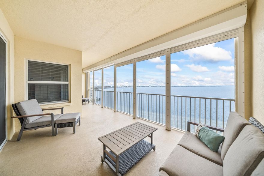 From the moment you step through the door, endless Intracoastal Waterway views unfold before you in this 3-bed 2-bath luxury penthouse on Florida's Space Coast. With over 2,000 sf, the open layout lives large.  Updated interior with LVP flooring throughout and fresh designer paint is move-in ready. The kitchen offers 42'' cherry cabinetry, granite countertops, stainless appliances, and Fisher-Paykel dishwasher drawers. Deep covered balcony overlooks the Intracoastal--ideal for morning coffee, dolphin watching, or viewing rocket launches. Ample storage and a private one-car garage add convenience. Community amenities include two pools, fitness center, sauna, and tennis courts. Minutes to beaches, boating, waterfront dining, and shopping--come live the island life! sauna, tennis, and riverfront boardwalk. Mere minutes to beaches, oceanside and riverfront dining, and shopping. Come live the island life!