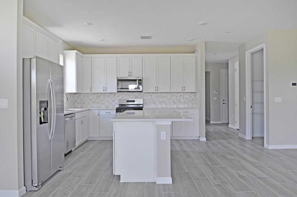 Photo of 13609 SW VERMILLION Circle, Port Saint Lucie, FL 34987 (MLS # B26067600)