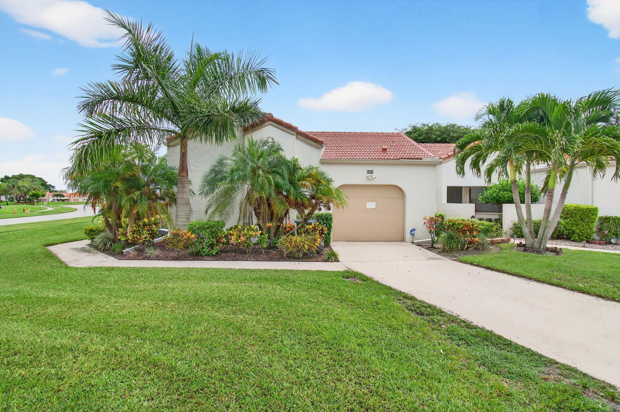 Meticulously maintained for your fussiest Buyer. Don't miss showing this rarely available Driftwood Model. This corner unit Villa features a lovely courtyard entrance, beautiful landscaping and serene lake views... The stunning kitchen is a chef's delight with wood cabinetry, stainless appliances, cooks center island and granite counters. This home features 3 bedrooms (the 3rd bedroom is used as an open den/office but can easily be converted), 2 remodeled baths and to add to your living space, a glass and screen enclosed air-conditioned Lanai (the lanai is not included in the square footage). Vaulted ceilings make this unit light and bright. Enjoy the many amenities of Aberdeen East with NO MEMBERSHIP FEES. The clubhouse amenities are all included in your HOA