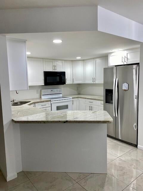 Photo of 6520 Chasewood Drive #C, Jupiter, FL 33458 (MLS # B26078945)