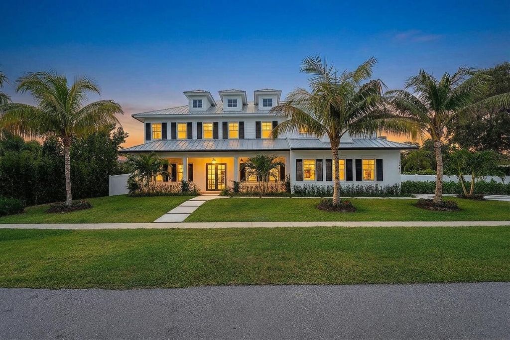 Photo of 11823 Lake Shore Place, North Palm Beach, FL 33408 (MLS # B26007460)