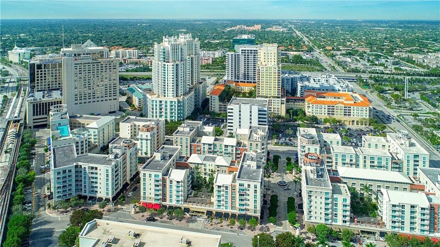 Live right above the first-class restaurants at Downtown Dadleand! Incredible top floor unit w/ high ceilings & is  1 of only 2 condos on the 7th floor! Custom finishes include marble floors, Container Store walk-in closets and blackout blinds throughout. Enjoy the convenience of one of the best locations in all of Miami, easy access to Sunset Place, Merick Park and Coconut Grove. Metrorail station right on the property which can take you to Brickell and even the Miami International Airport; Only 2 stops to University of Miami campus. Additional parking for sale and/or rent. Condo fees include Cable, Internet, Water and Trash. Long term month to month tenant can stay or the unit can be vacant at closing. Easy to show anytime.