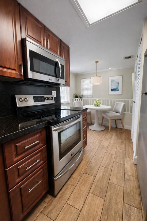 Photo of 2837 N Course Drive #202, Pompano Beach, FL 33069 (MLS # B26015631)