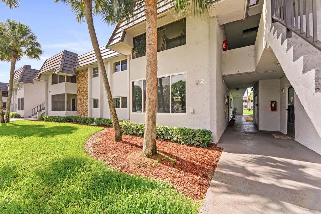 Photo of 8410 W SAMPLE Road #110, Coral Springs, FL 33065 (MLS # B26065014)