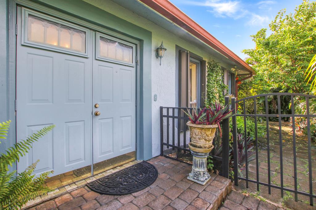 Super sized Corner Villa For Sale in All Ages community!This large 3 bedroom / 2.5 bathroom unit feels like a Single Family Home with its spacious living room, immense dining room and sizeable kitchen. There are several little surprises as you walk the property from an enormous driveway, to a computer room with extra storage closets to a quaint family room to a master bedroom that has both an exterior and interior entrance...perfect for a mother-in-law suite. Perhaps most impressive is the garden oasis that flanks the property on all 3 sides. All the beautiful flowers and plants really put a smile on your face and peace in your soul. The community itself is just as thrilling with it's 2 pools, gym, tennis courts, spa, hot tub, library, bocce ball and shuffleboard courts. Don't take