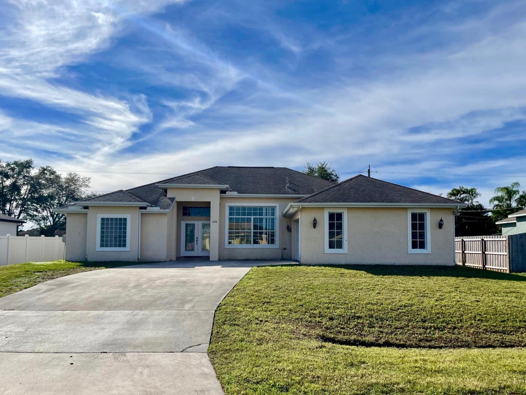 Photo of 3978 SW Laffite Street, Port Saint Lucie, FL 34953 (MLS # B26045731)