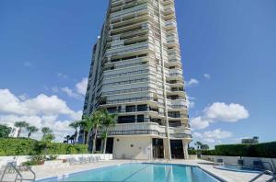 EXCLUSIVE AND ECLECTIC LARGE CONDO WITH WRAP AROUND TERRACE AND FLOOR TO CEILING SLIDING DOOR WINDOWS WITH PANORAMIC VIEWS OVER  PALM BEACH AND WEST PALM BEACHAND  OVERLOOKING THE LAKE AND THE GOLF COURSE. WETBAR FOR ENTERTAINING AND THIRD BEDROOM HAS BEEN OPENED UP AS A DEN.  CARRARA MARBLE FLOORS IN LIVING AREA. UPDATED KITCHEN WITH BREAKFAST NOOK W/TERRACE. SPECIAL MARBLE IN THE MASTER BATHROOM SUITE.