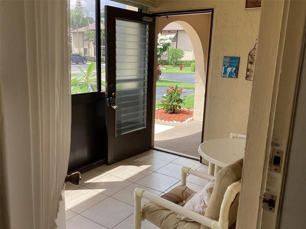 Photo of 439 Pine Glen Lane #D-1, Greenacres, FL 33463 (MLS # F10517054)