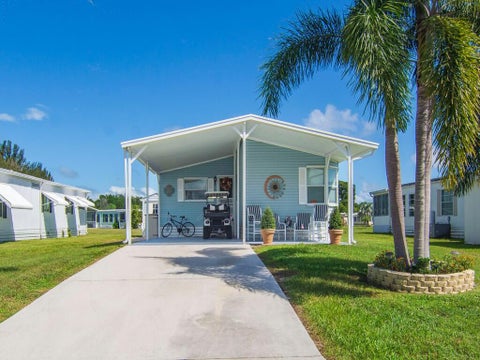 Photo of 5 Oliva Road, Port Saint Lucie, FL 34952 (MLS # B26081165)