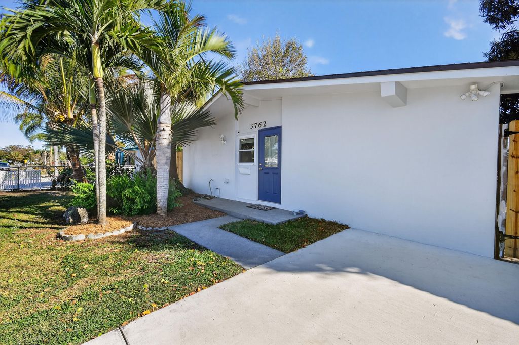 Photo of 3762 Florida Boulevard, Palm Beach Gardens, FL 33410 (MLS # R11166716)