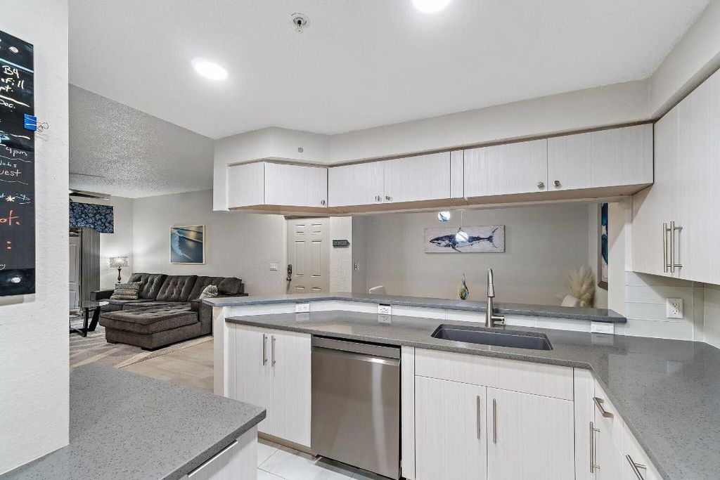 Photo of 3021 Alcazar Place #103, Palm Beach Gardens, FL 33410 (MLS # R11153950)