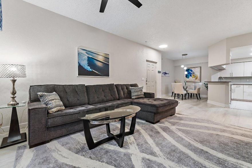 Beautifully and tastefully updated end unit first-floor condo with garden view in desirable San Matera in Palm Beach Gardens. Worry-free living with new AC, renovated kitchen with extra cabinets and counter space, new SS appliances, granite counters, renovated bathroom, new tile and LVP flooring, new fixtures, plantation shutters, and screened patio. Accordion shutters for peace of mind. Great location: close to shopping, restaurants, world class golf and beach.